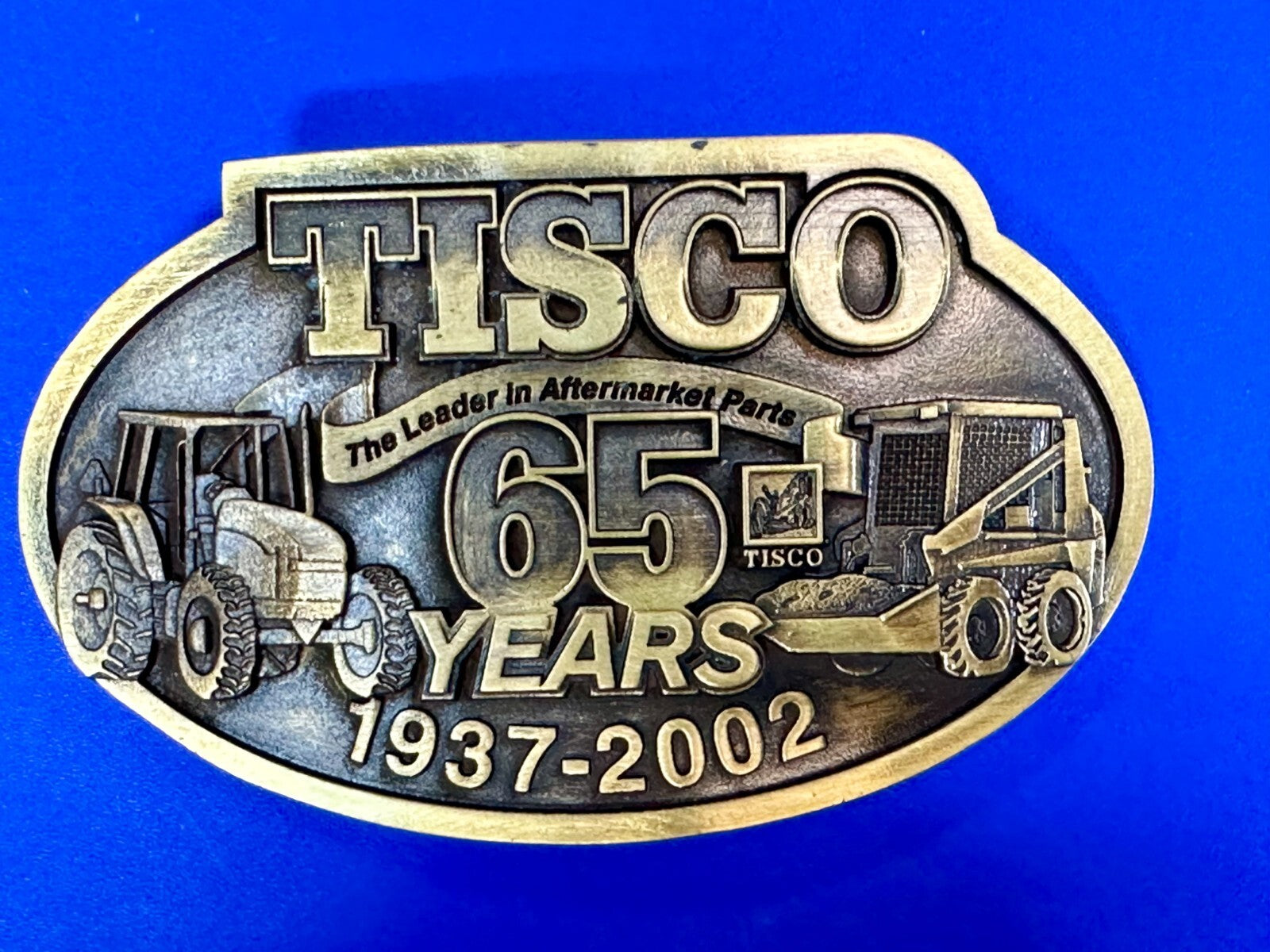 TISCO 65 Years 1937-2002 Series XIV The Leader in Aftermarket Parts Belt Buckle