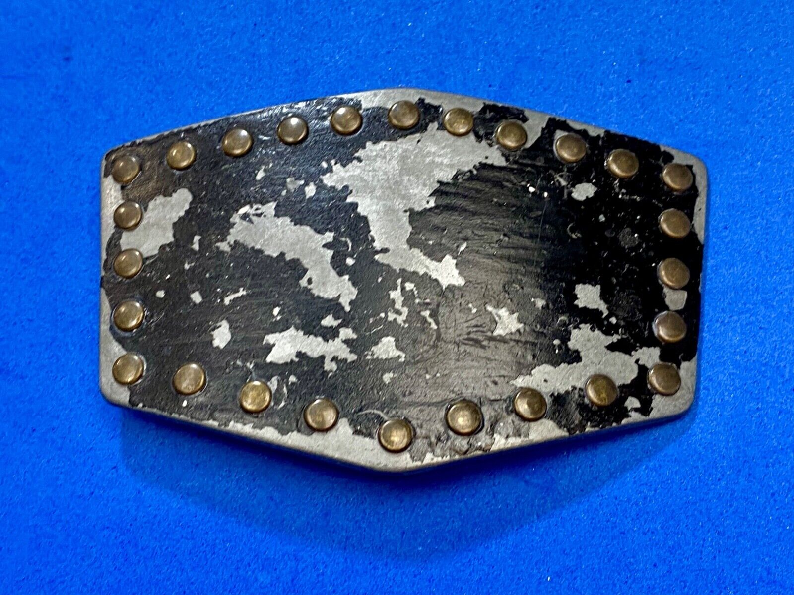 used metal studded black faded paint belt buckle for your craft or project
