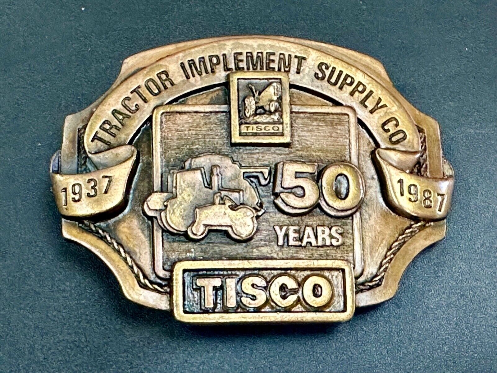Tisco 50 year celebration Tractor farm supply company promo 1986 belt buckle