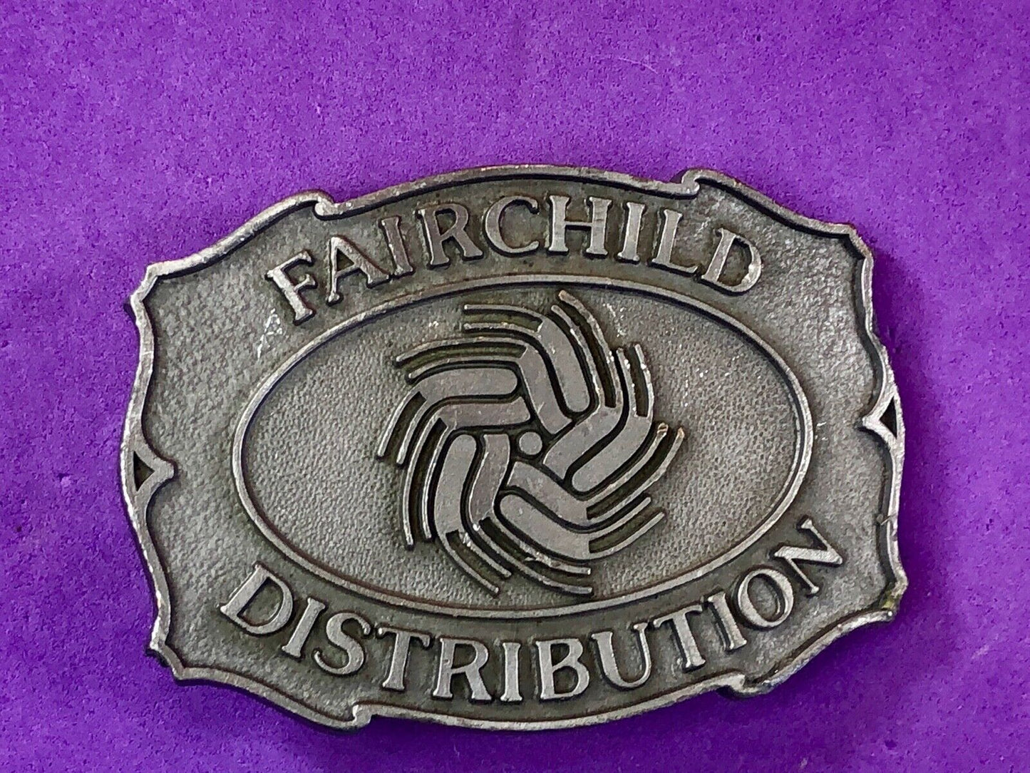 Vintage Fairchild Distribution company logo promotional belt buckle 