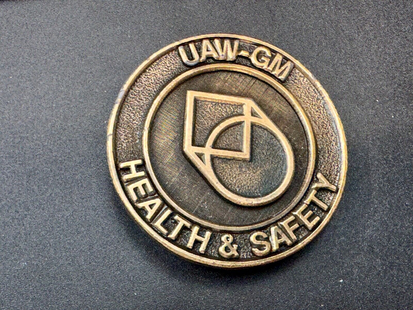 UAW-GM auto workers union round Health & Safety Award belt buckle