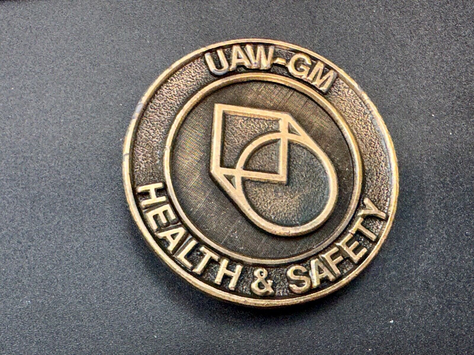 UAW-GM auto workers union round Health & Safety Award belt buckle