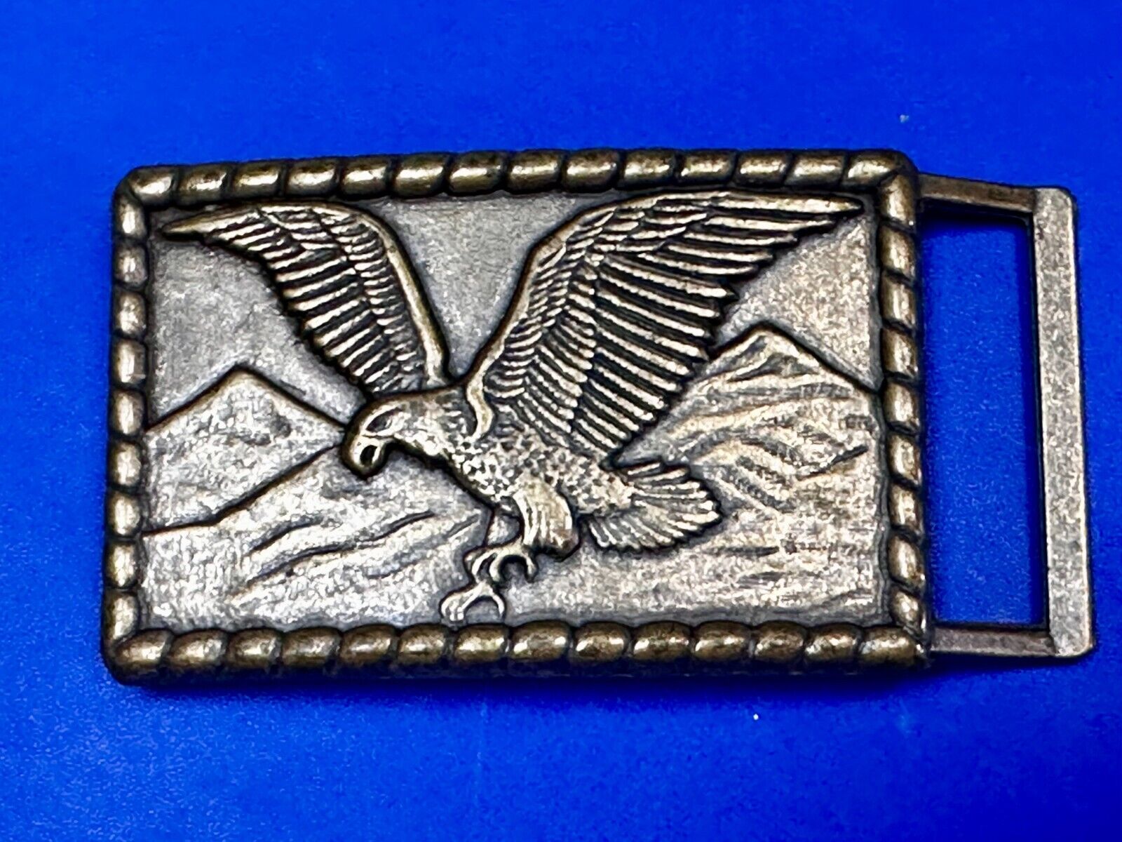 American Bald Eagle flying over majestic USA mountains Vintage Belt Buckle