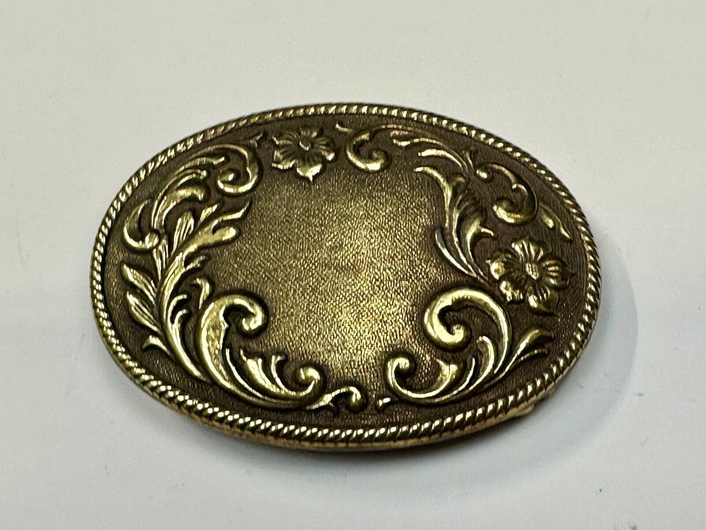 USA made vintage western flower swirl design oval belt buckle marked W