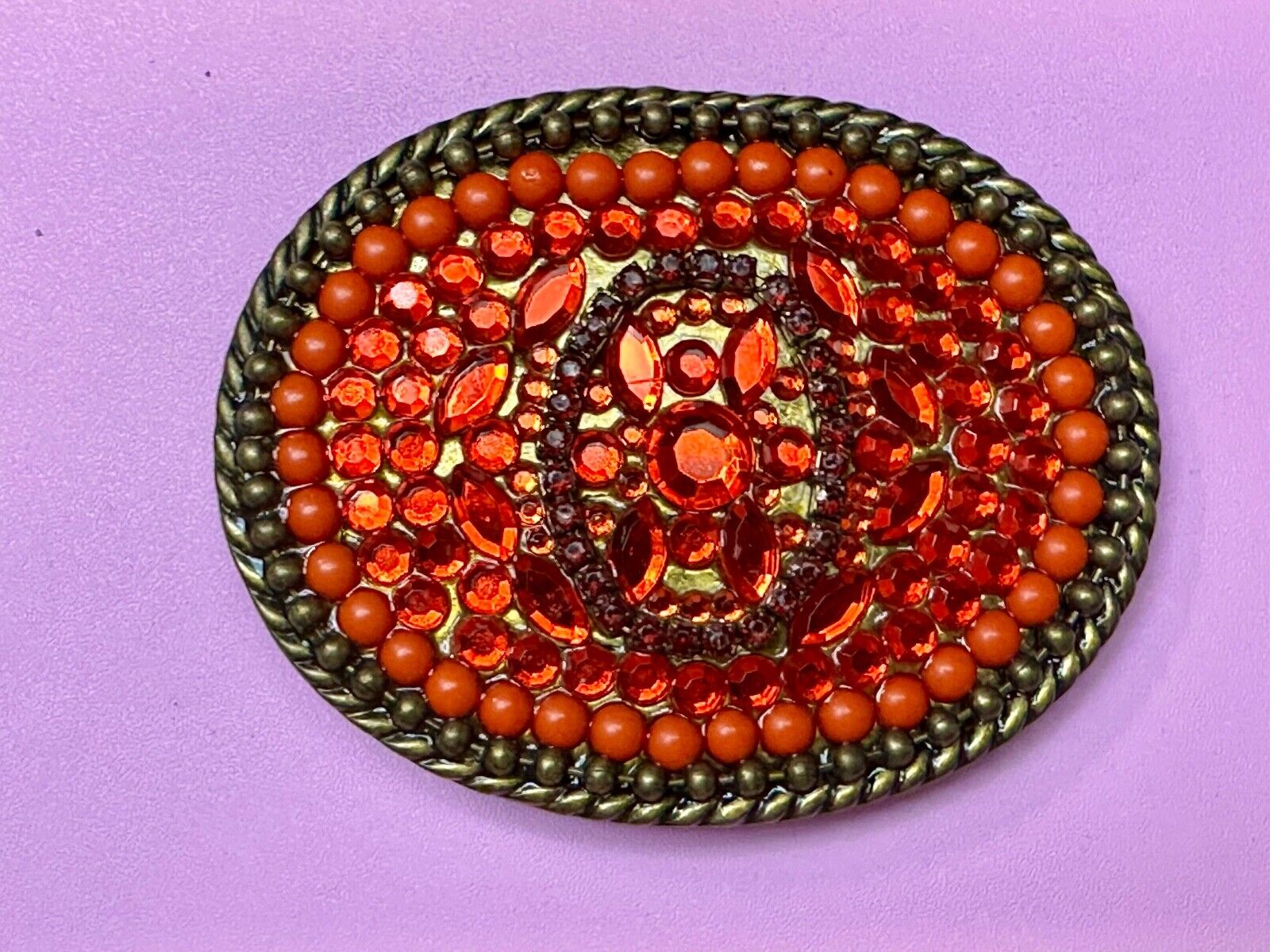 Unique Shades of Red - Mixed Materials oval outlined Belt Buckle