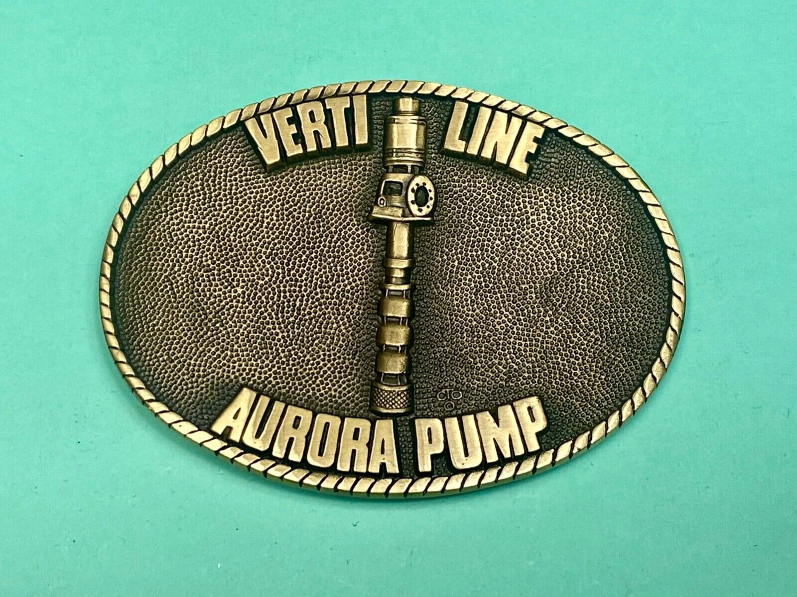 Verti line Aurora Pump belt buckle by OC Tanner Turbine pumps Co commemorative