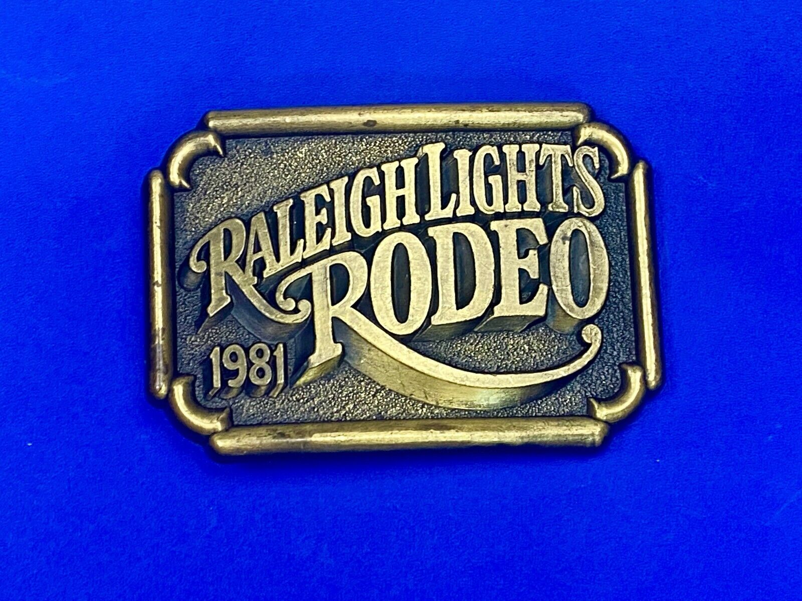 Vintage 1981 Raleigh Lights Rodeo Tobacco Company Advertising Belt Buckle