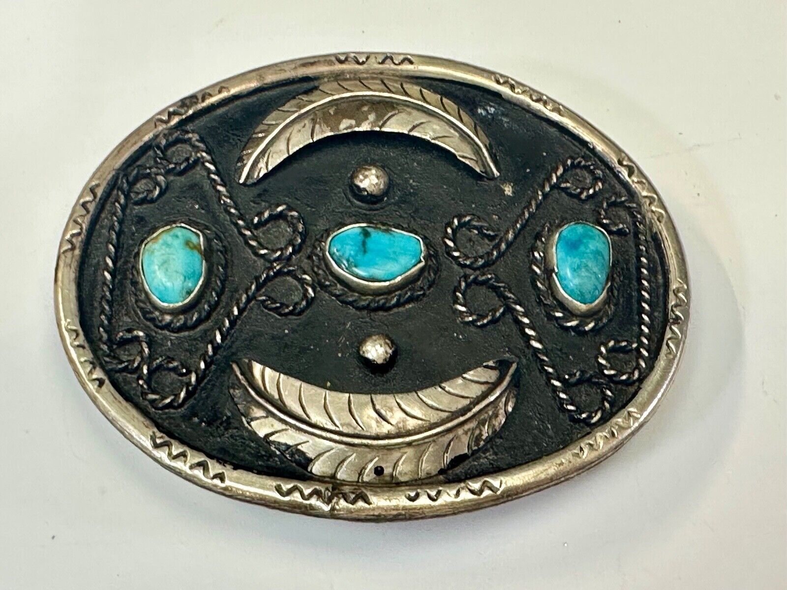 Turquoise stones raised feathers vintage belt buckle marked Sterling 0925 Mexico