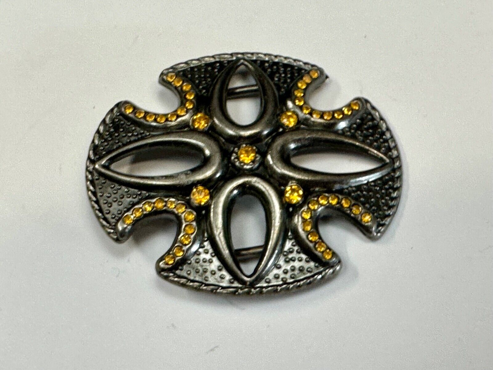 unique see through iron cross with golden brown rhinestone accents