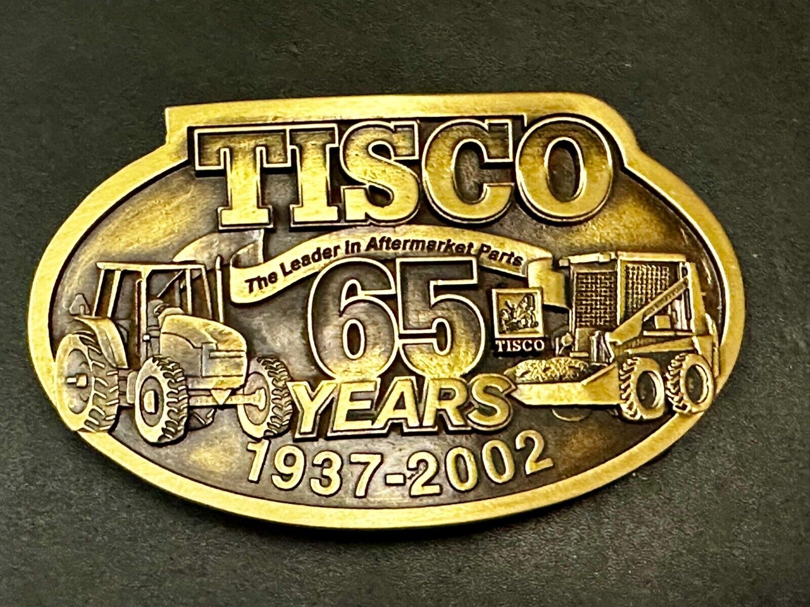 65 Years TISCO 2002 Tractor Implement Supply company NOS Belt Buckle