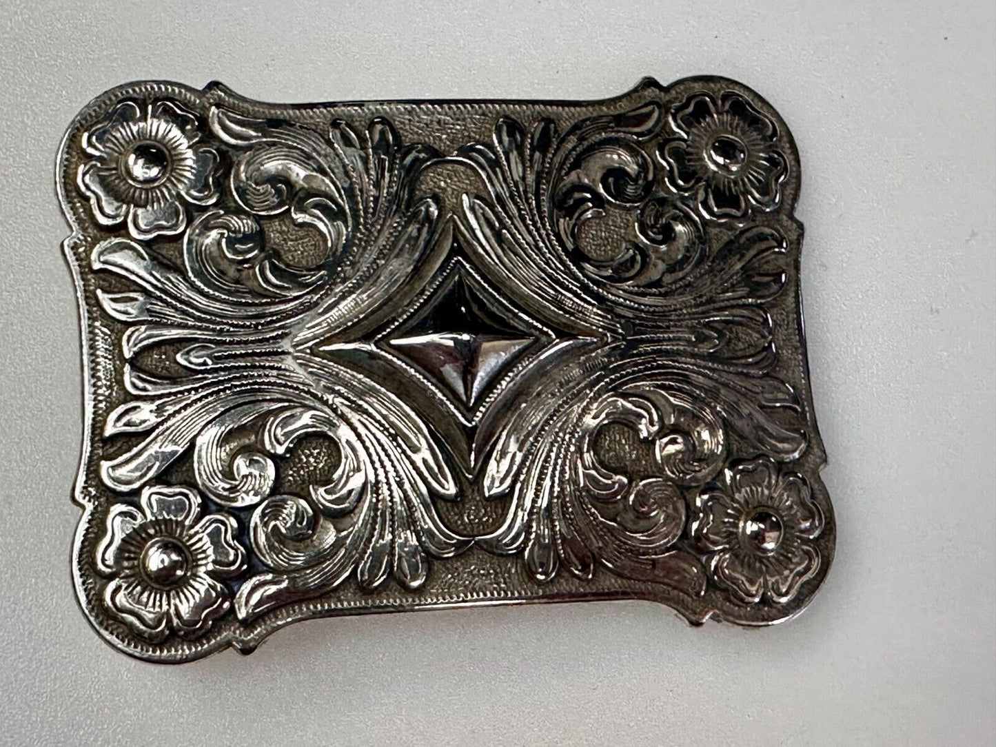 Vintage Ivan Brand Raised Diamond Center Flower Swirl Design Belt Buckle