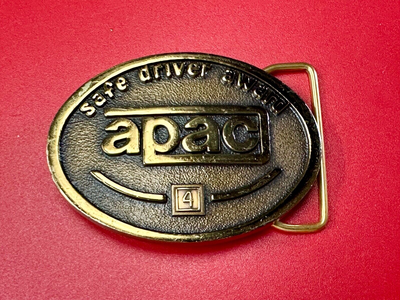 APAC Safe Driver Award belt buckle with 4 year pin by Jostens