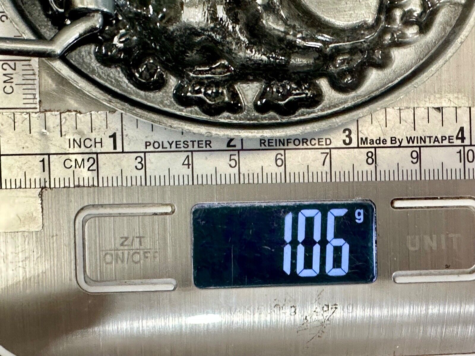 Western Cowboy Boots Belt Buckle with ornate flower swirl and rope boarder