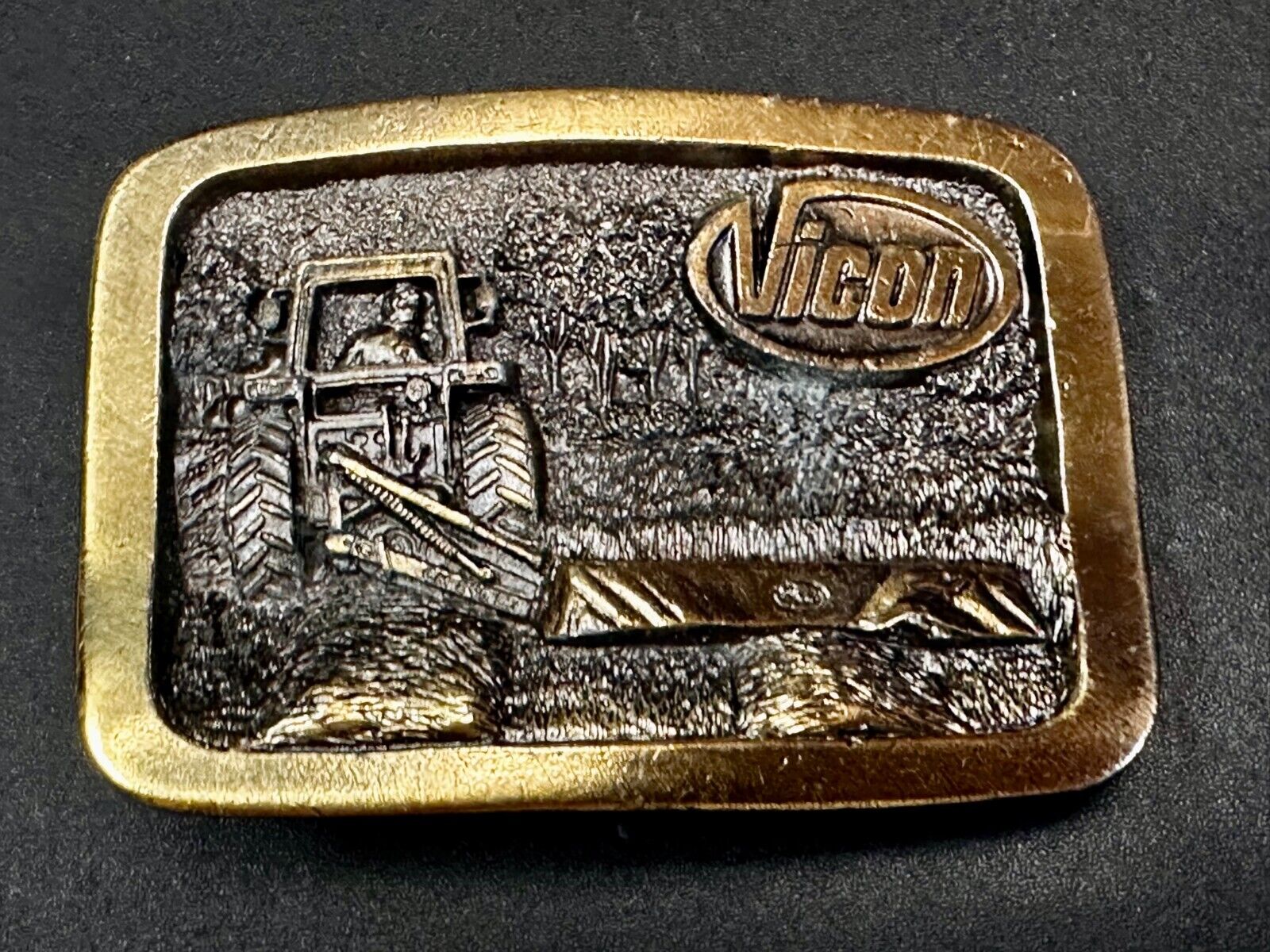 Vicon Disk Mower Tractor Promotional Belt Buckle by Premium Specialties