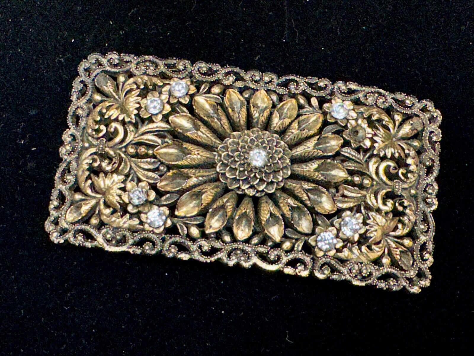 Antique gold tone? Flower theme Rhinestone covered scarf slide belt loupe buckle