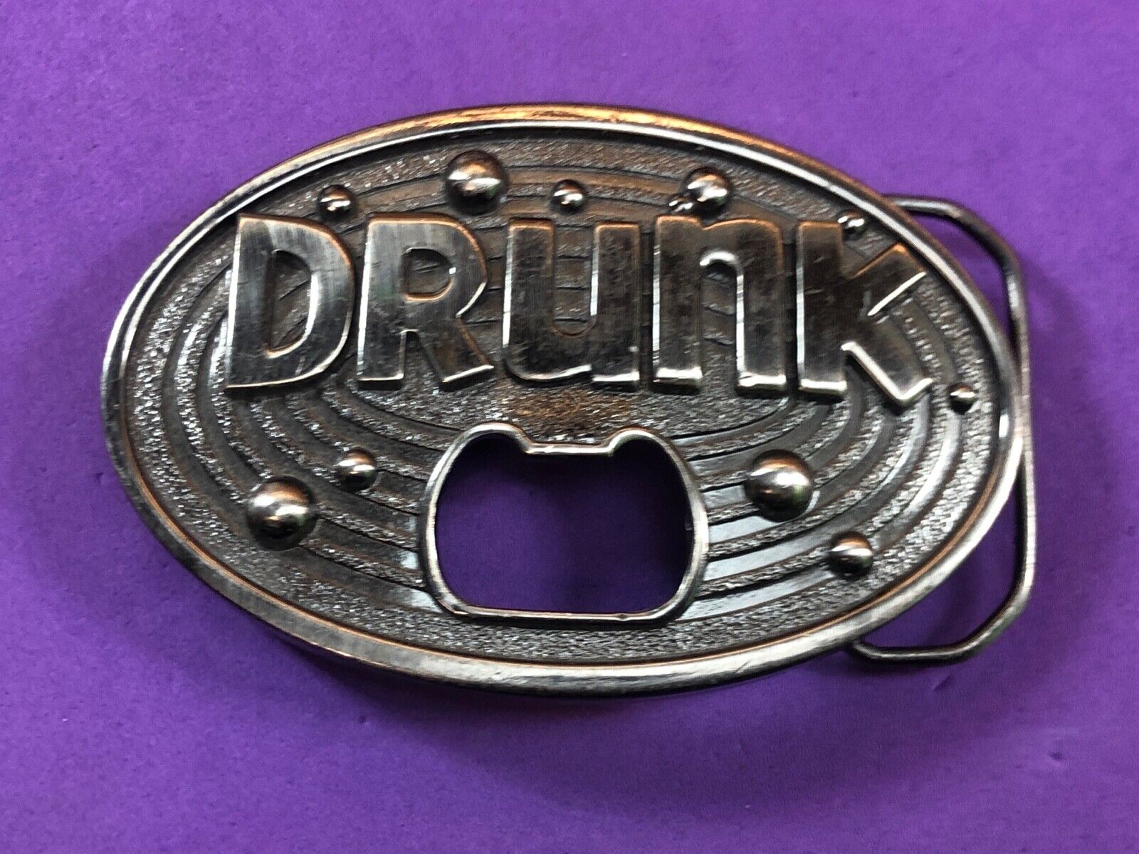 vintage large metal Bottle Opener / belt buckle - words DRUNK   Beer glass party