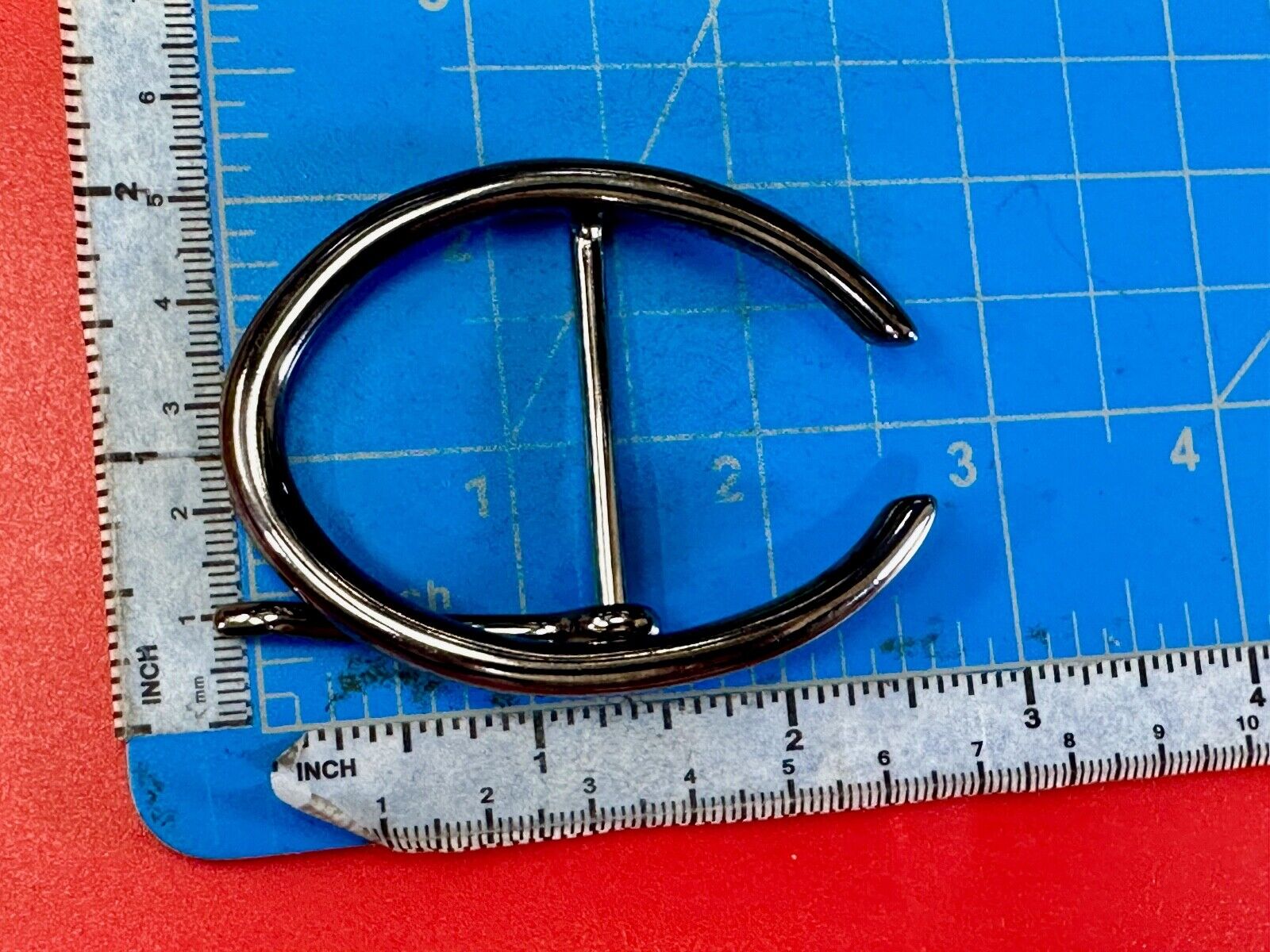 unique open oval black colored dress style belt buckle