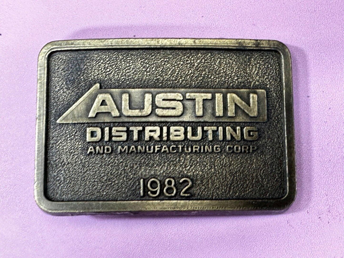 Austin Texas Distributing and Manufacturing 1982 Advertisement Promo Belt Buckle