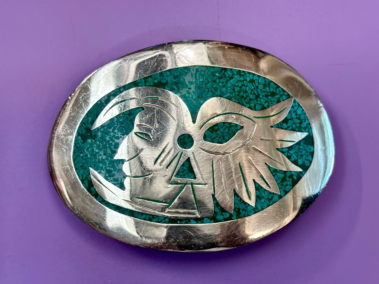 Tribal Face - Inlaid Turquoise chip to Alpaca stamped oval Belt Buckle