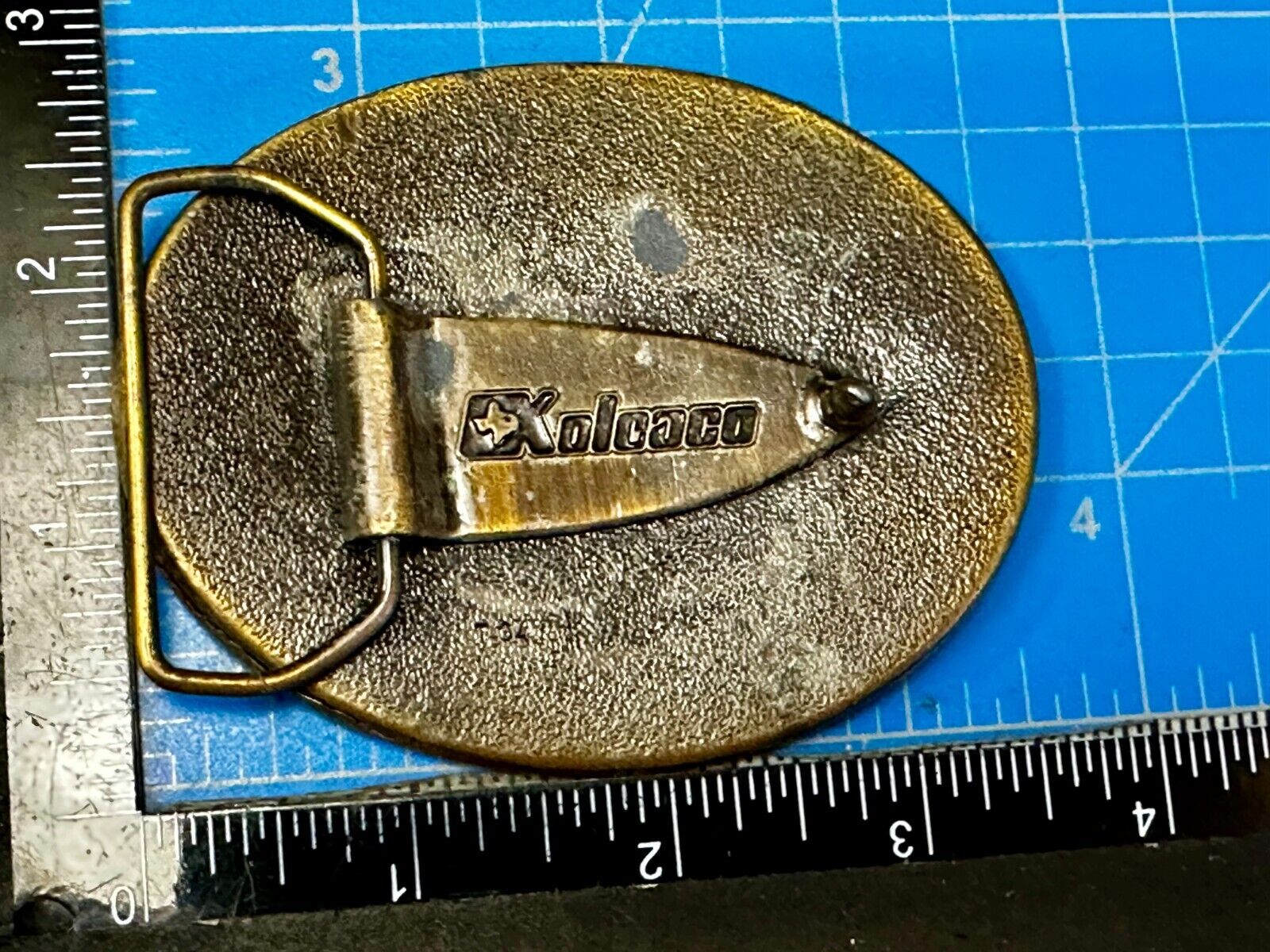 Texas Home of the Armadillo Commemorative Red colored Belt Buckle by Koleaco