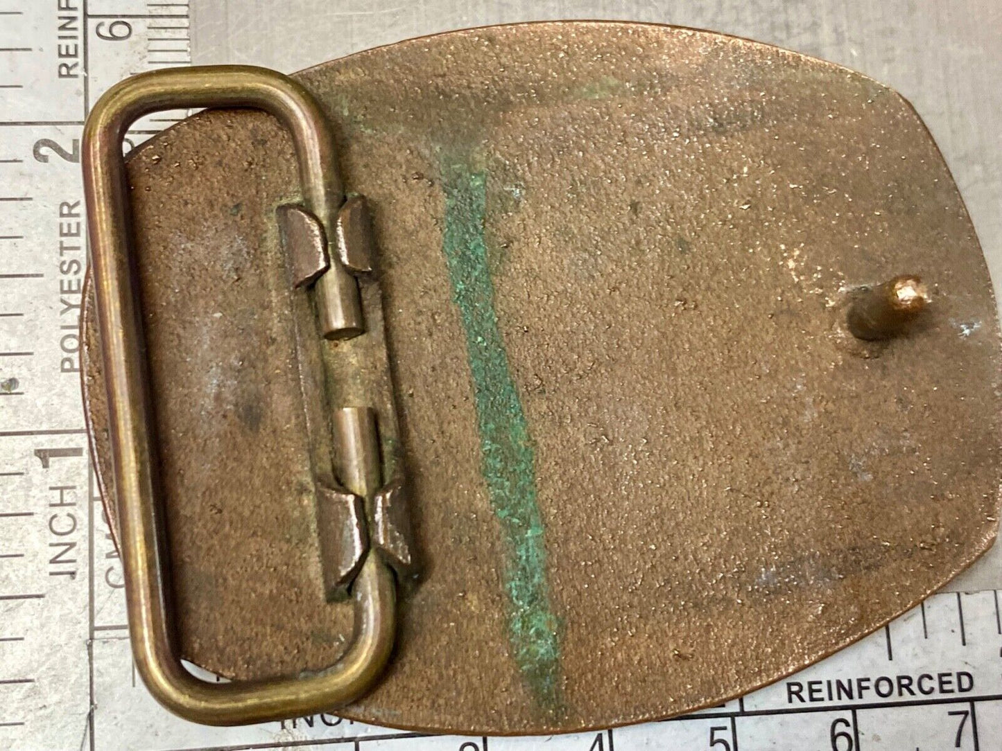 unknown to me - cattle branding symbols? longhorn western? belt buckle