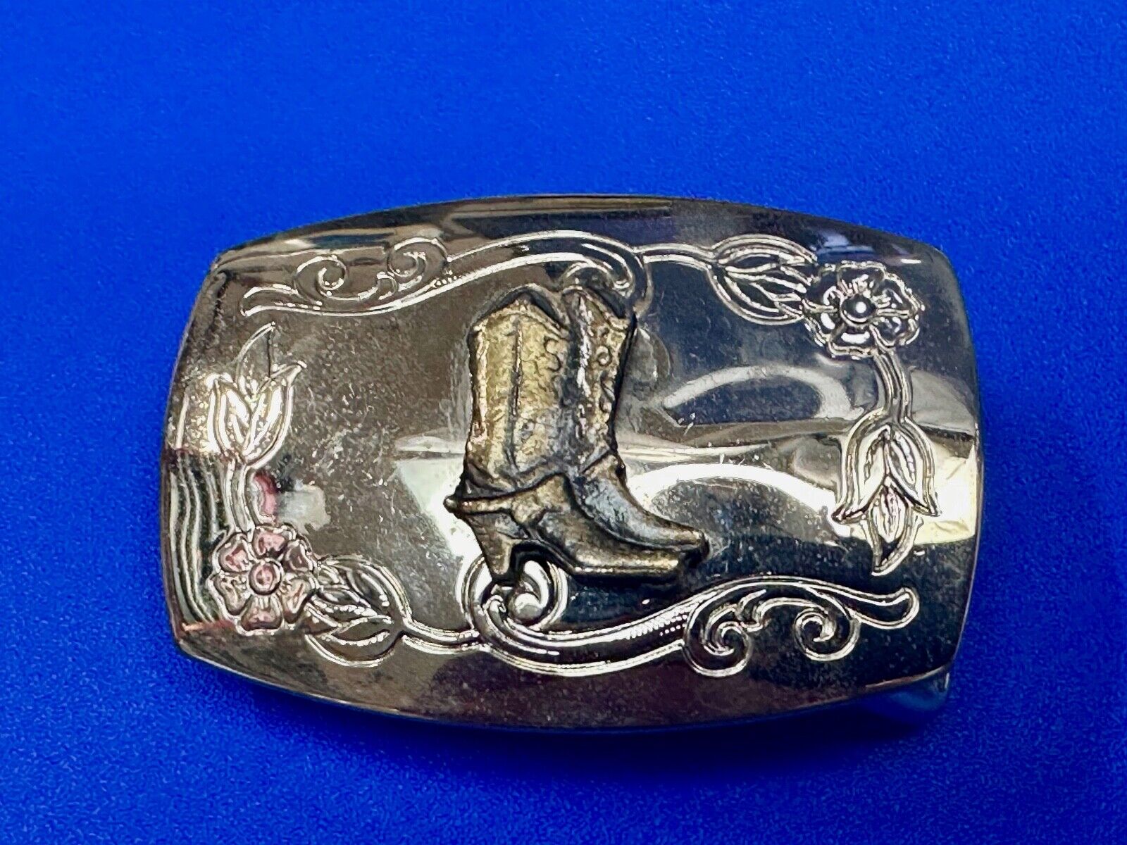 USA made Western Cowboy boots on reflective two tone vintage belt buckle