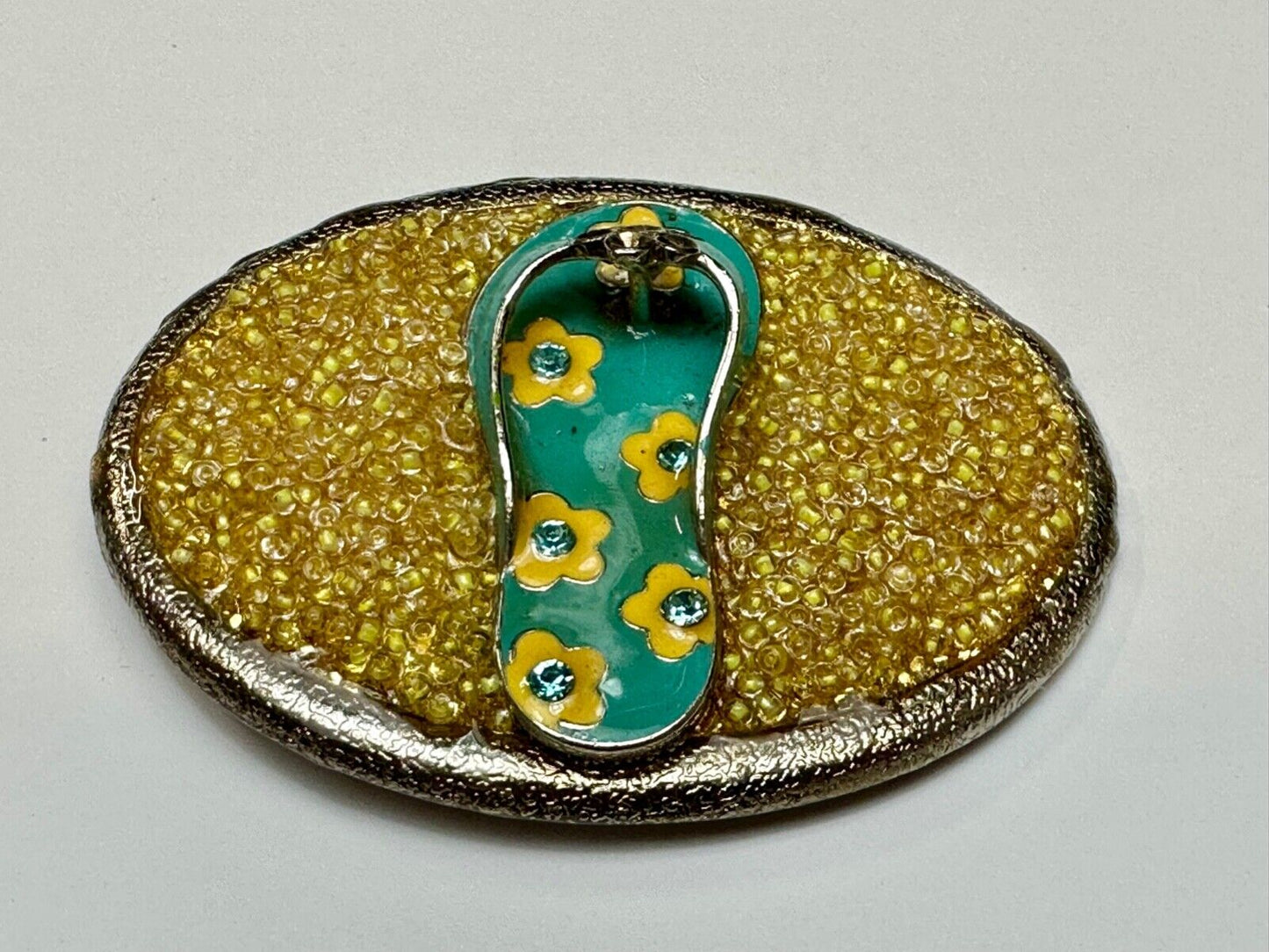 unique flip flop on sand - beach girls artisan belt buckle - missing stones?