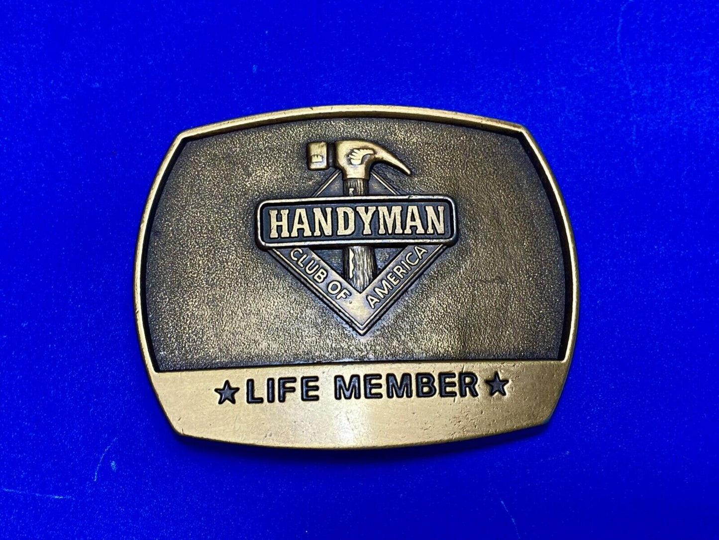 vintage handyman club of America Hammer Ruler- life member belt buckle