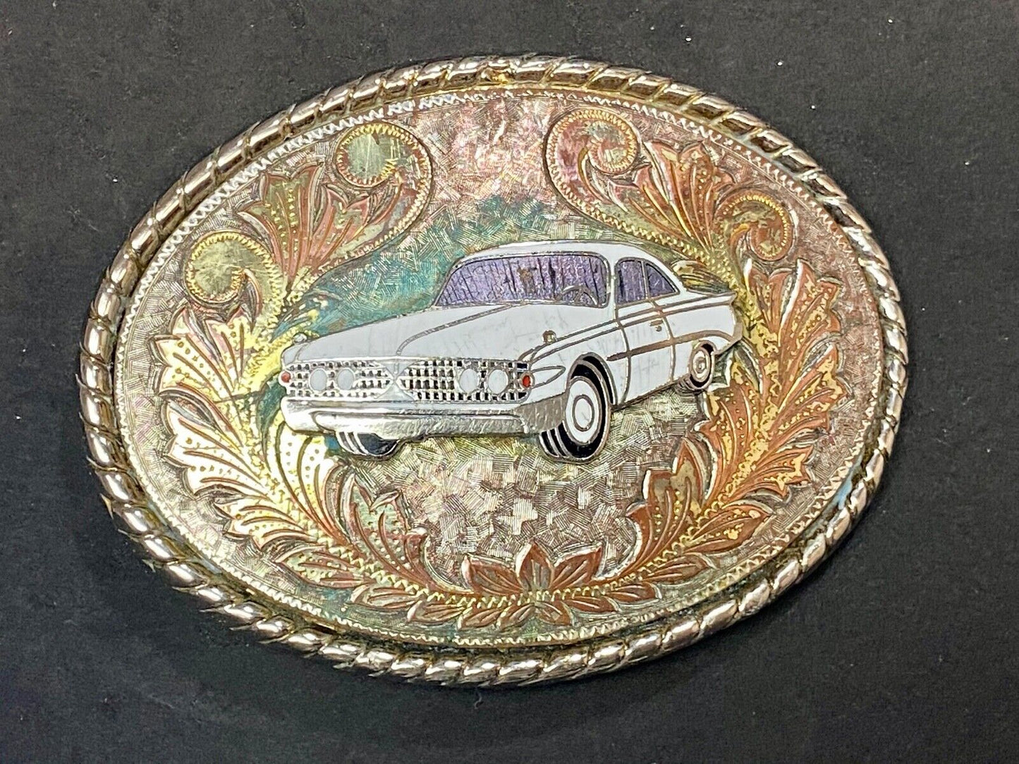 A custom Pimped out retro 70's Car - a caddy? on a western belt buckle signed W!