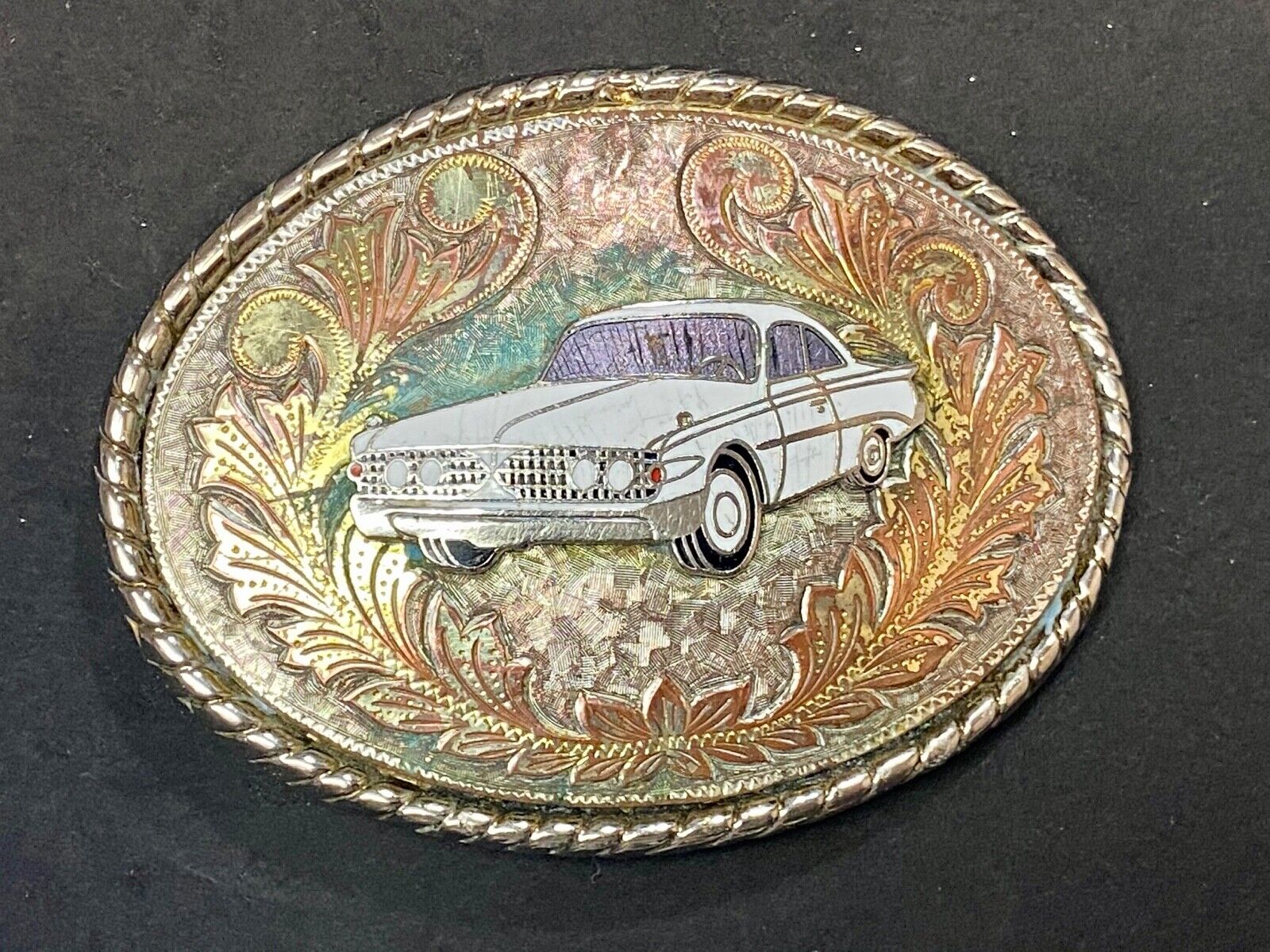 A custom Pimped out retro 70's Car - a caddy? on a western belt buckle signed W!