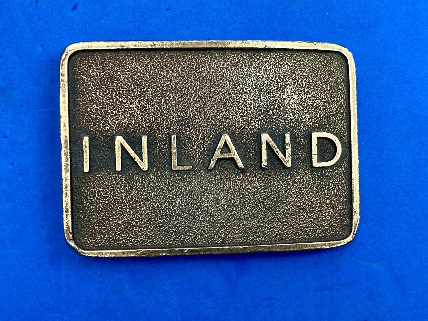 Vintage Inland company belt buckle - truck parts company 