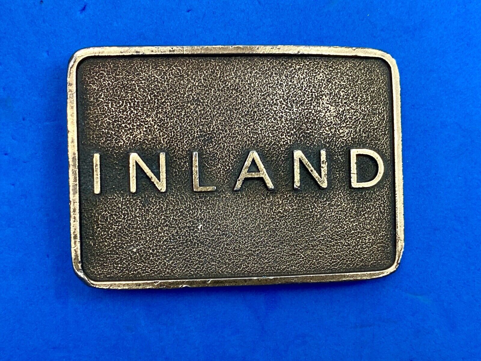 Vintage Inland company belt buckle - truck parts company 