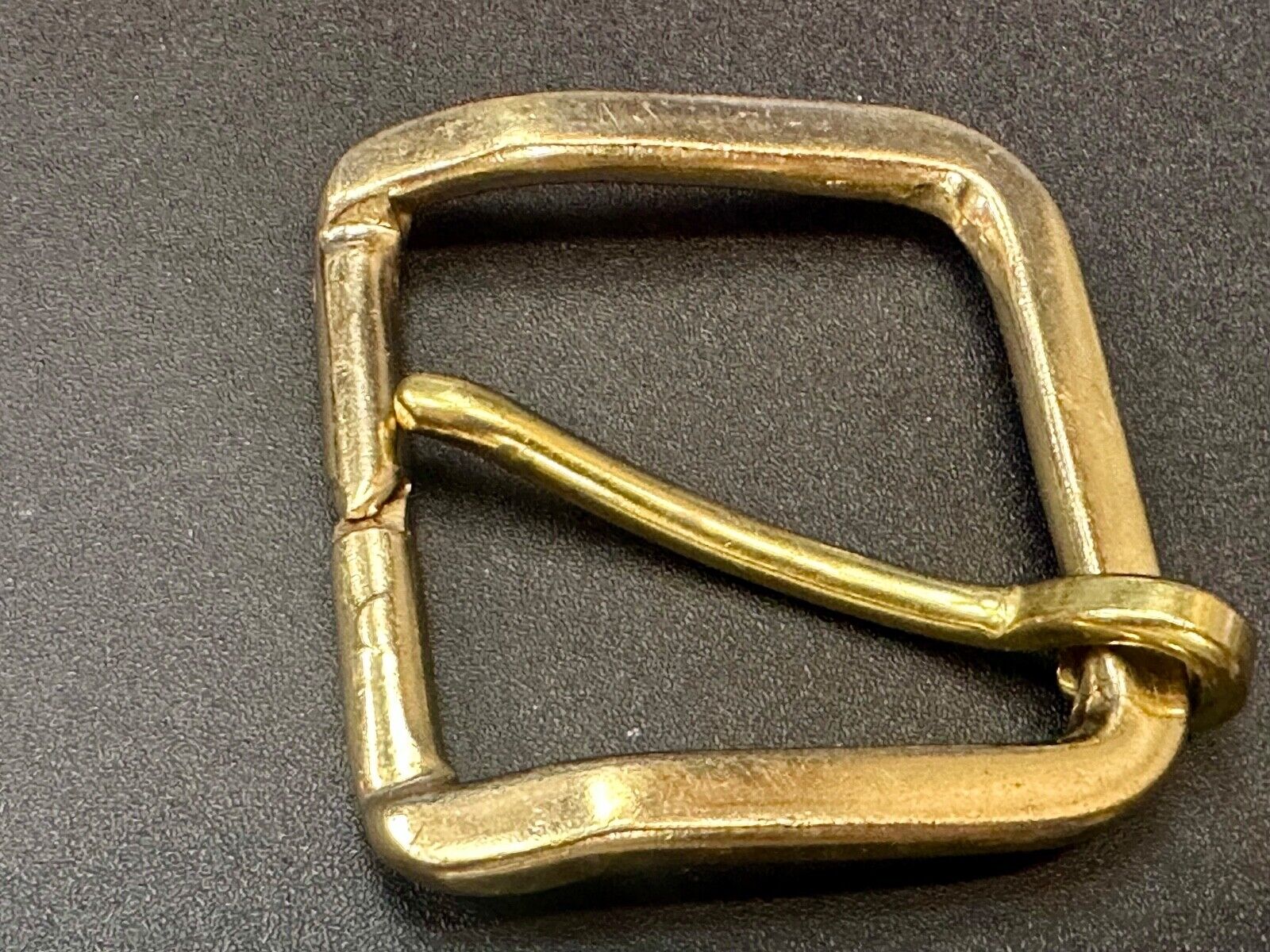 Vintage  replacement belt buckle marked W with unique angle