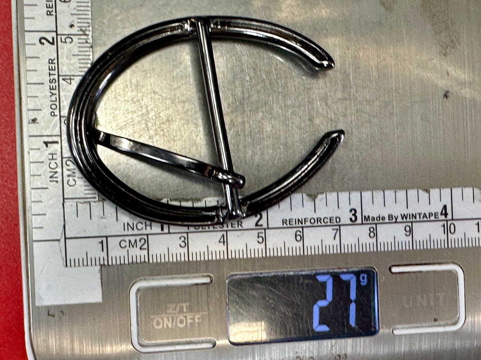 unique open oval black colored dress style belt buckle