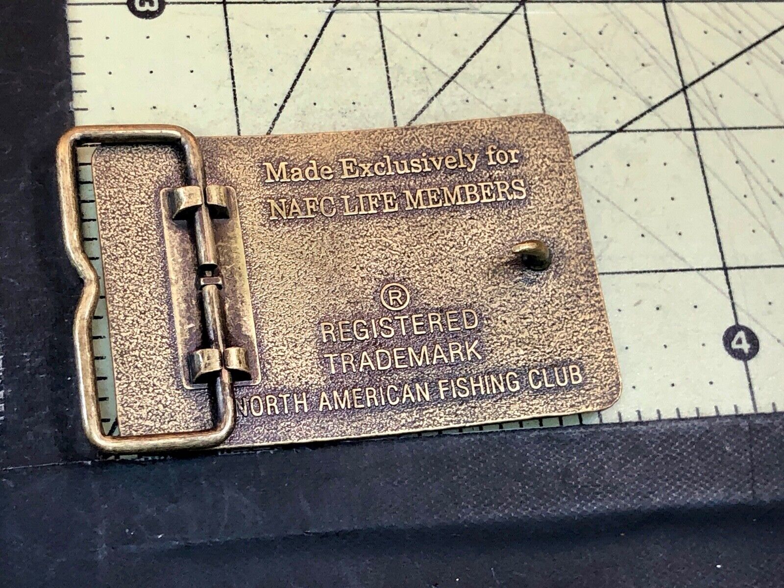 Vintage Life member to North American Fishing Club belt buckle 