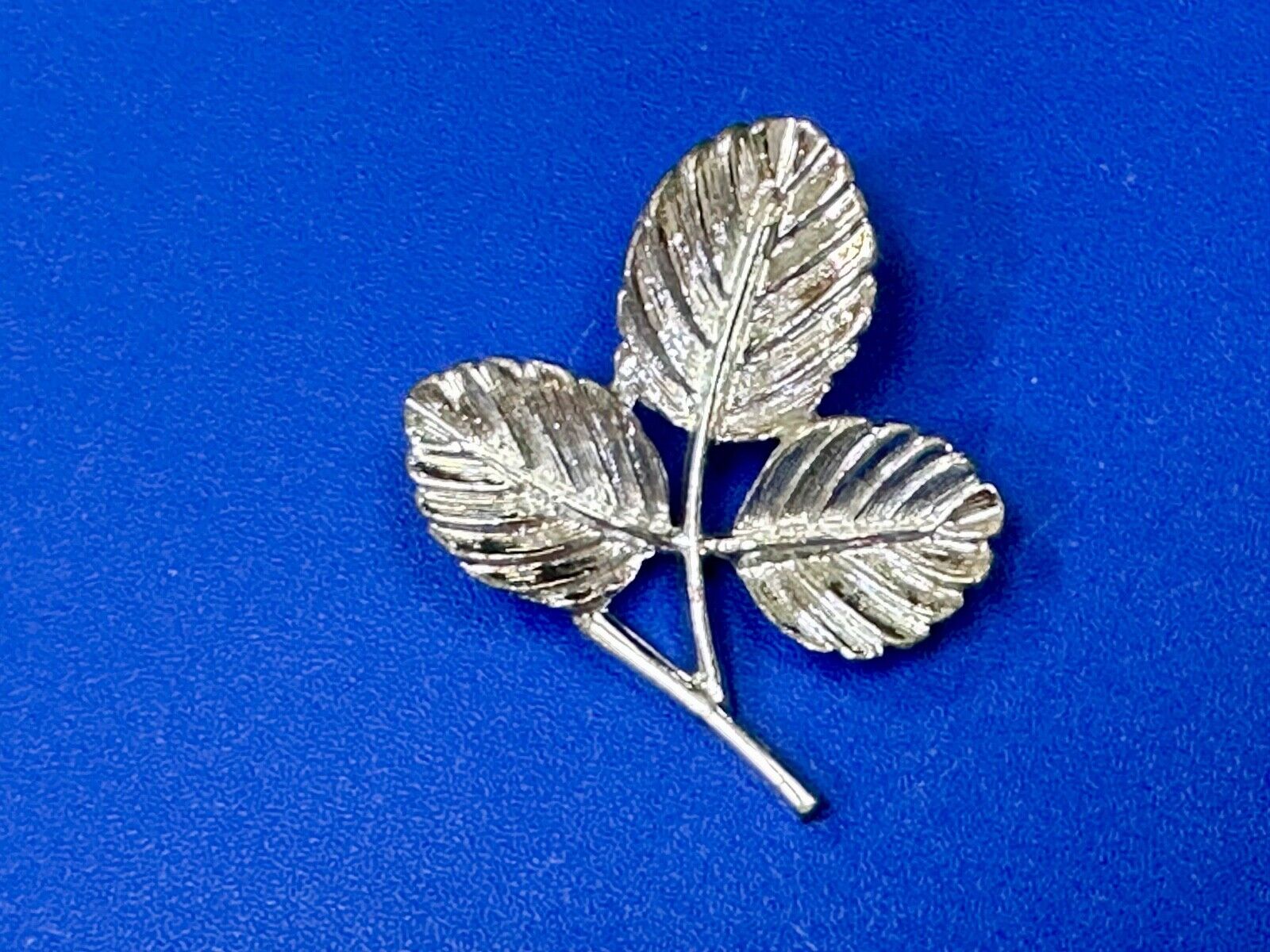 Three Leaf cutout Sarah Coventry signed silver tone brooch pin