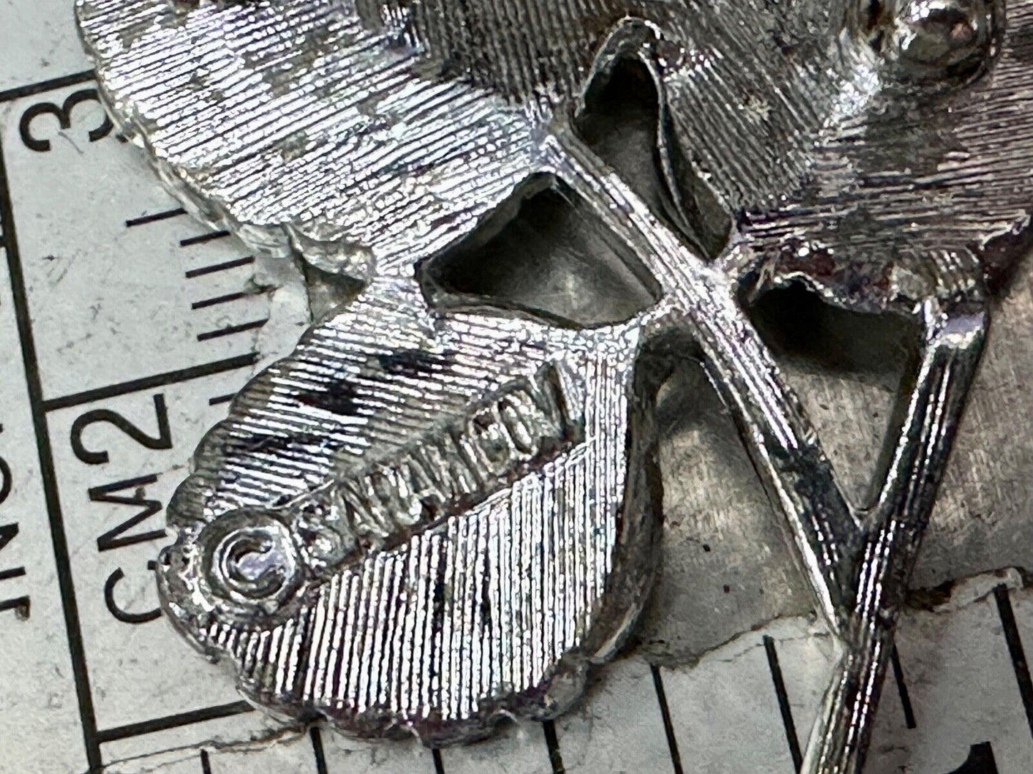 Three Leaf cutout Sarah Coventry signed silver tone brooch pin