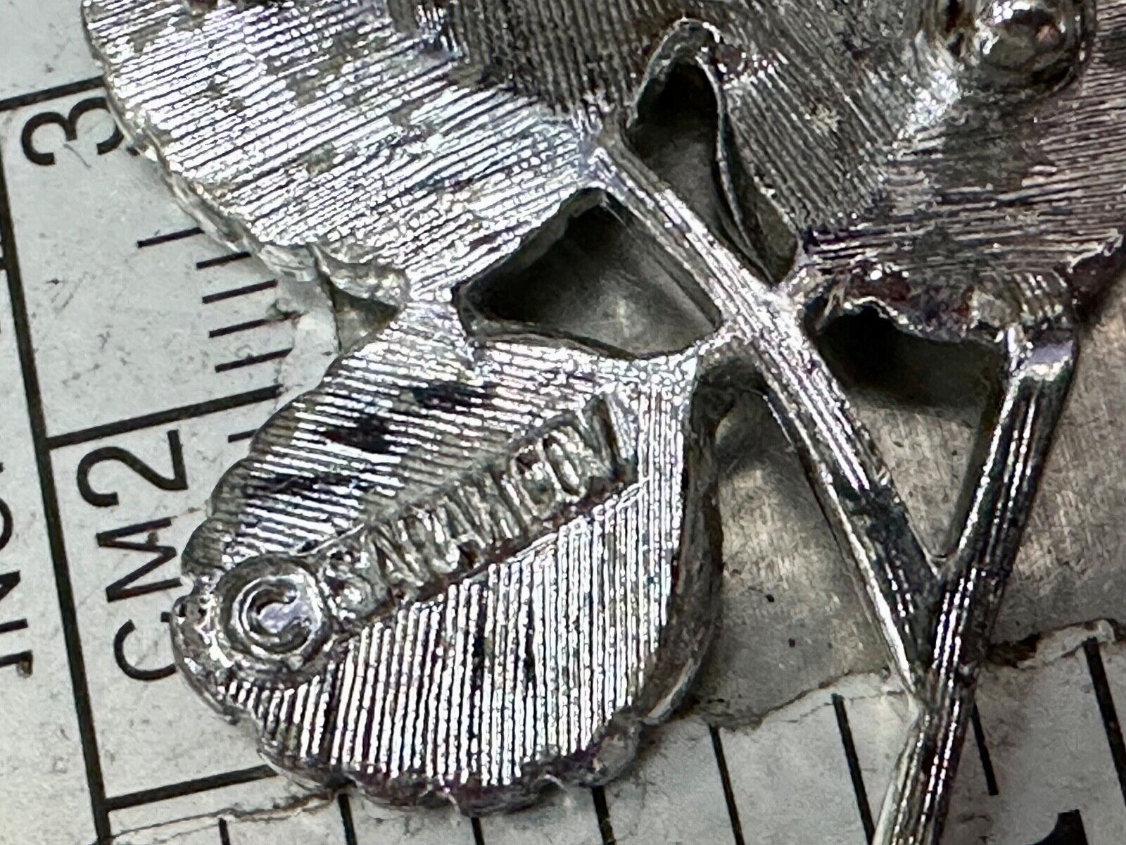 Three Leaf cutout Sarah Coventry signed silver tone brooch pin