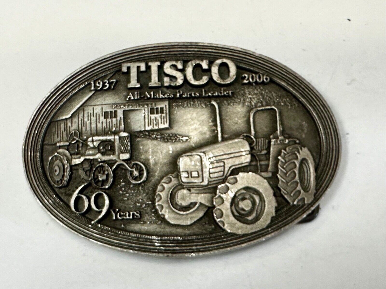 TISCO Tractor Implement Supply Replacement Parts 69 years - 2006 Belt Buckle