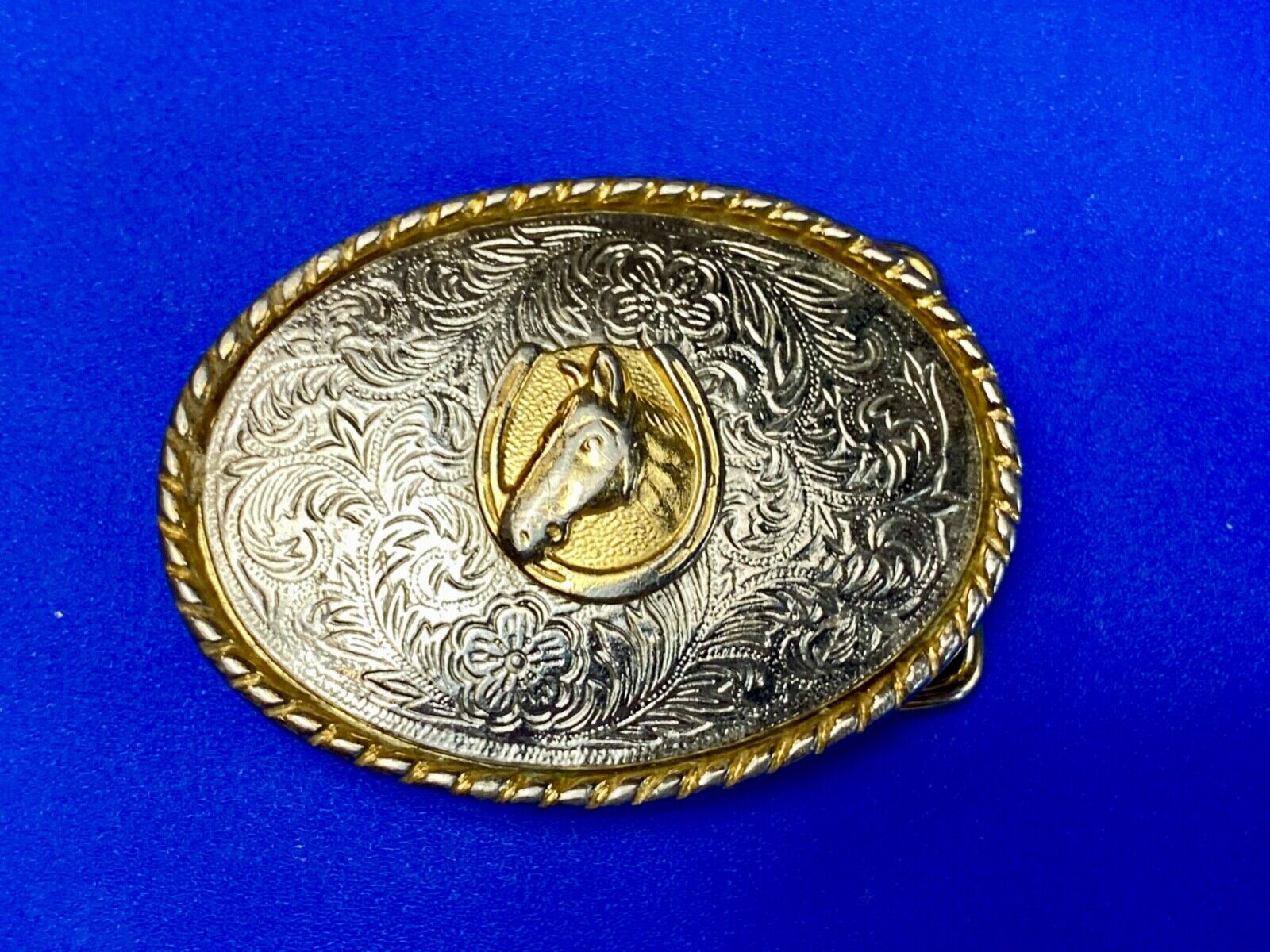 Vintage horse head inside of lucky horseshoe two toned western belt buckle