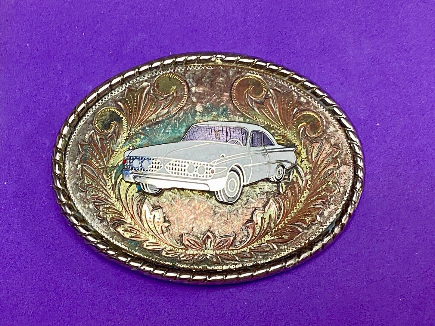 A custom Pimped out retro 70's Car - a caddy? on a western belt buckle signed W!