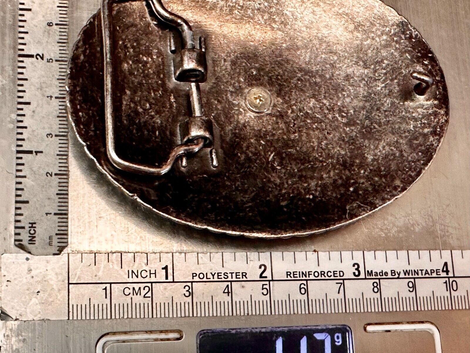 The Lone Star Centered In Oval Flower Swirl Silver Tone Belt Buckle