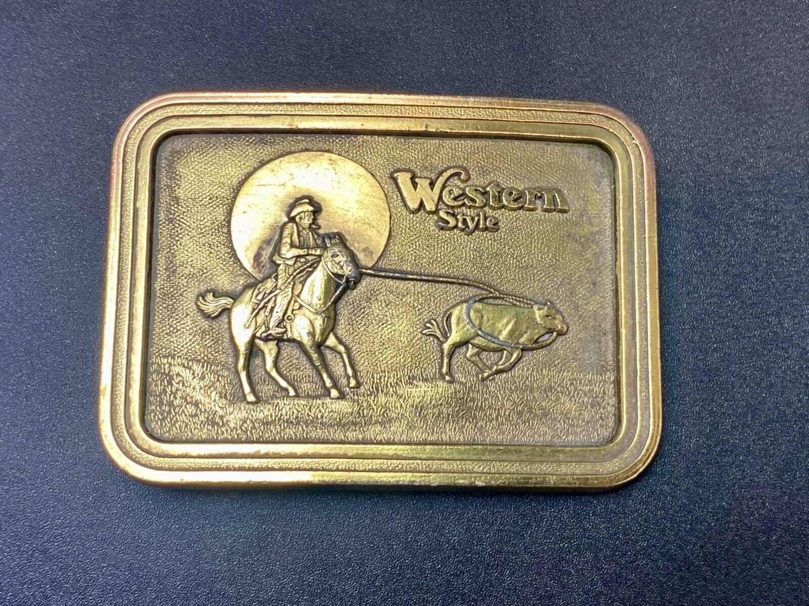 Vintage  - Western Style roping rodeo cowboy on range belt buckle