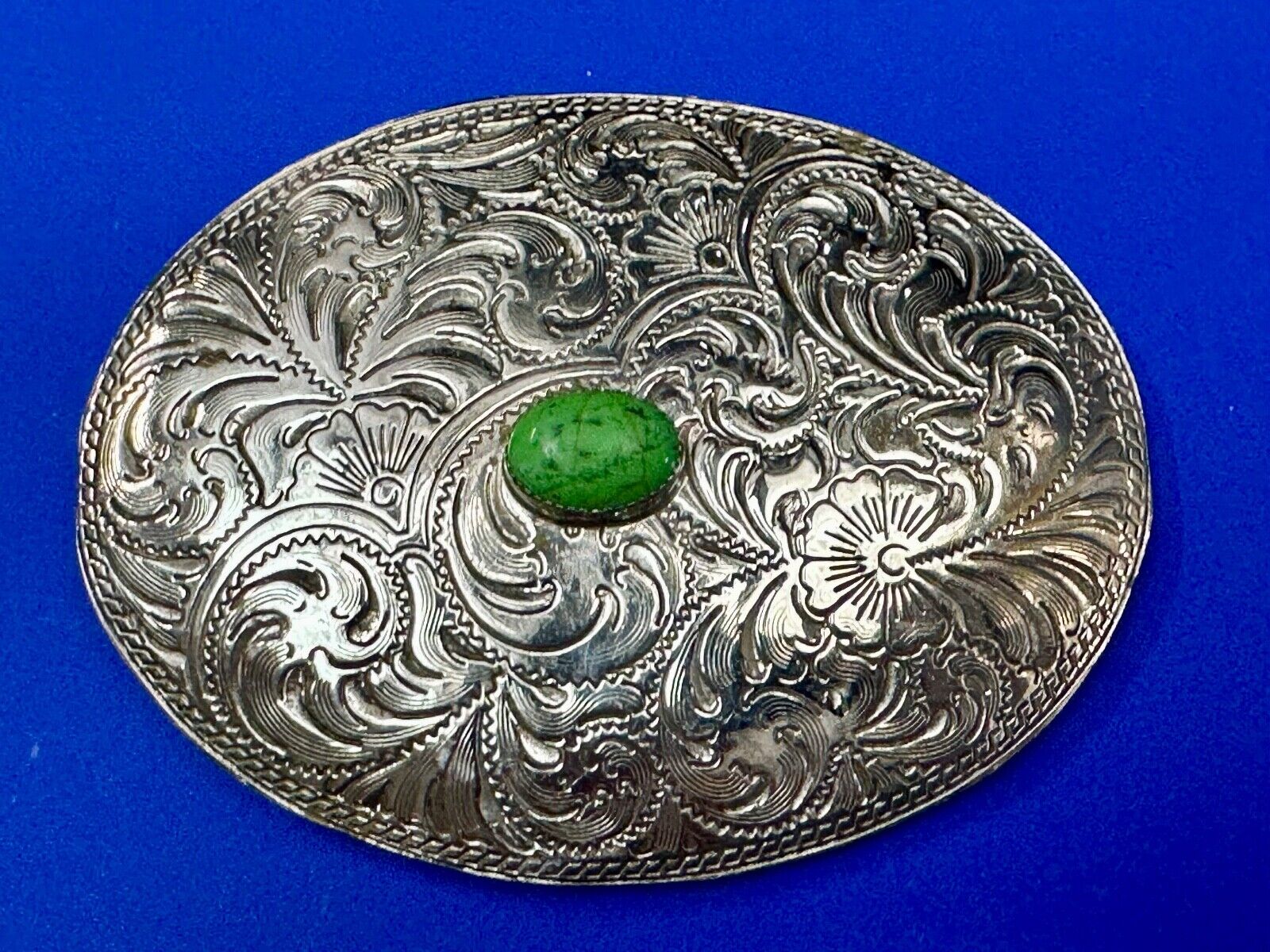 Artisan Made vtg Large western flower swirl design belt buckle  green center Cab