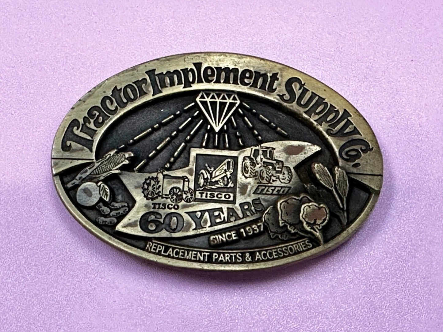 60 Years TISCO Tractor Implement Supply company NOS Belt Buckle by Speccast