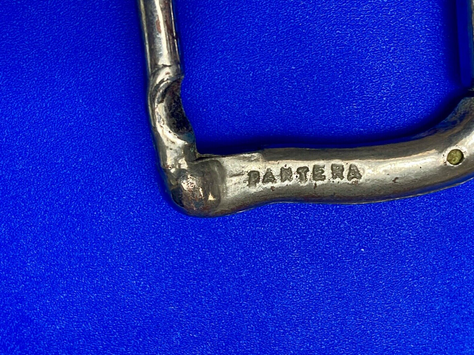Vintage dual arm  silver toned belt buckle stamped pantera 1610