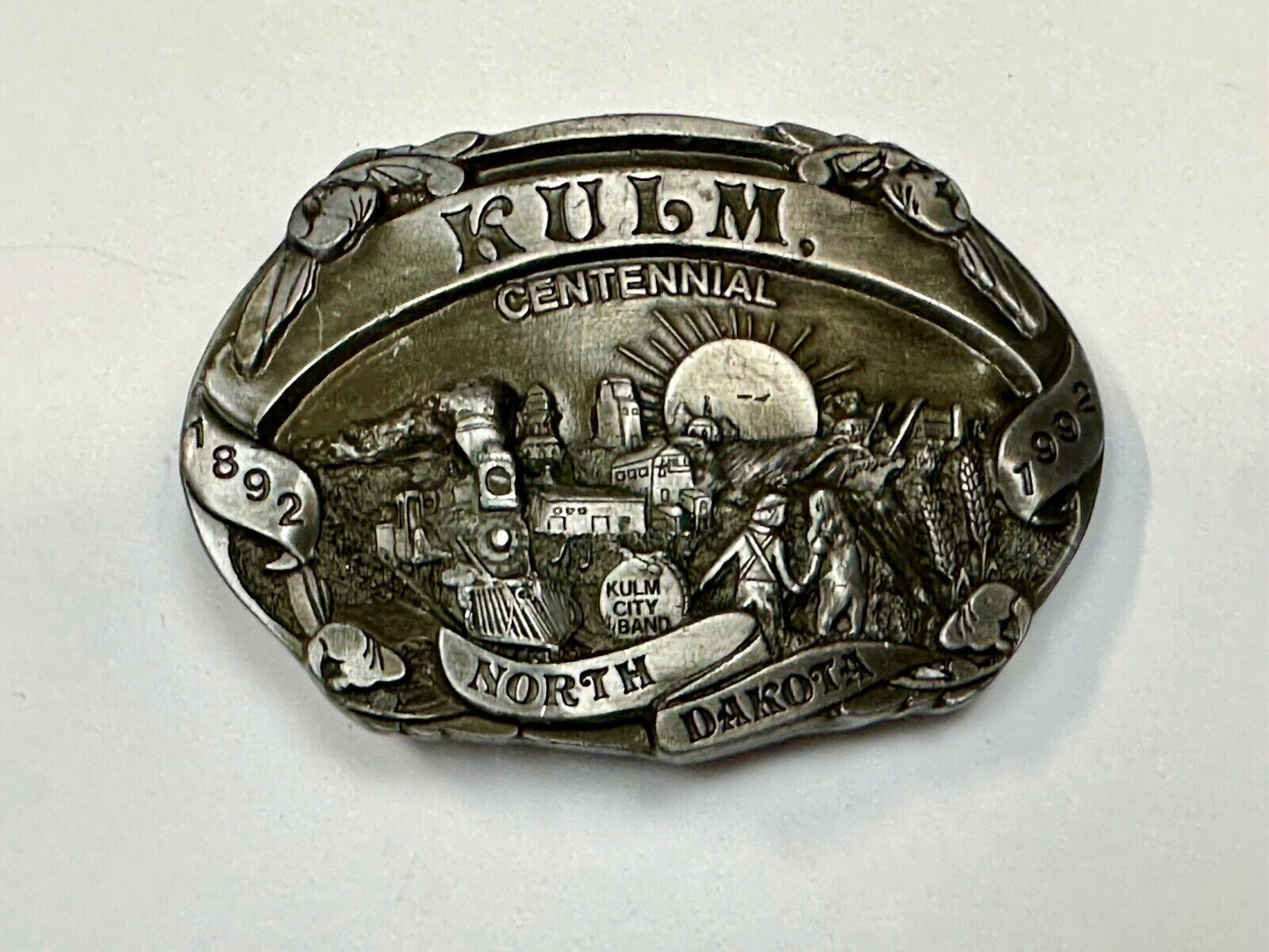 Vintage KULM North Dakota commemorative belt buckle by DART inc.