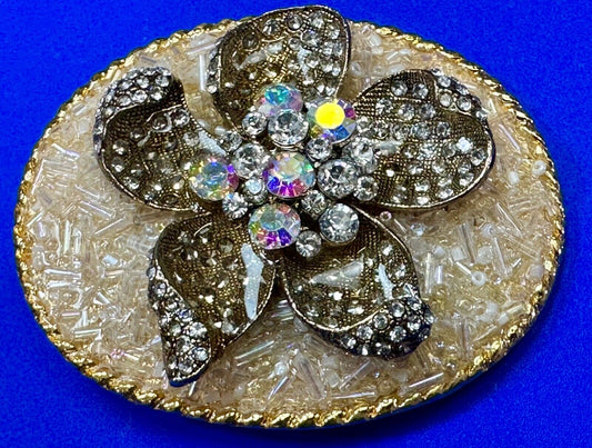 Beautiful chunky goldtone flower centerpiece in rhinestone accented belt buckle