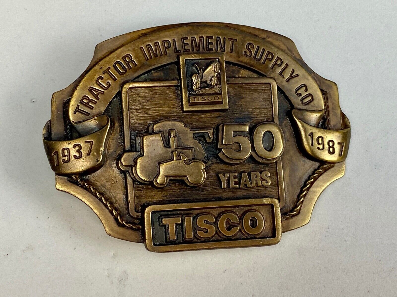 Vintage 1986 Tisco Tractor 50 years Anniversary Belt Buckle by Siskiyou 