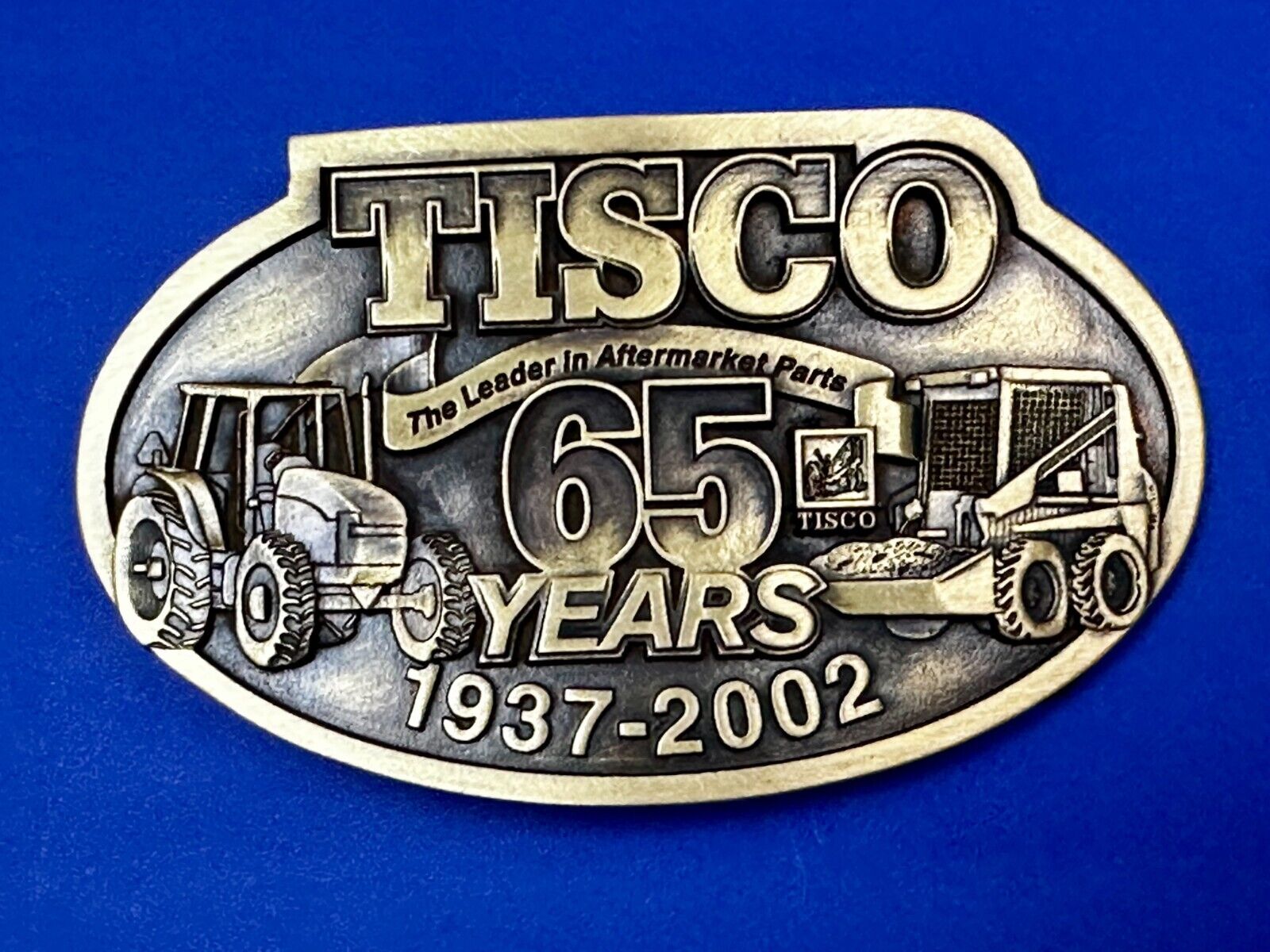 65 Years TISCO 2002 Tractor Implement Supply company NOS Belt Buckle